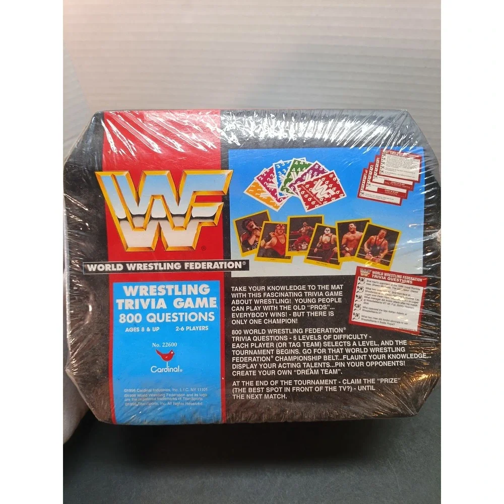 WWF Wrestling Trivia Game Tin SEALED NEW WWE ROCKY MAIVIA Rookie ROCK AUSTIN RC